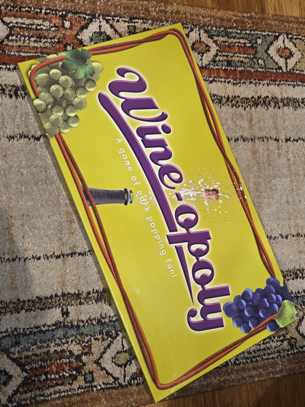 Wine-Opoly Board Game - Yellow Box with Purple Logo